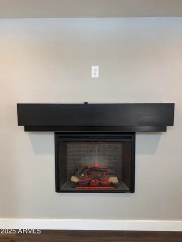 a living room with a fireplace