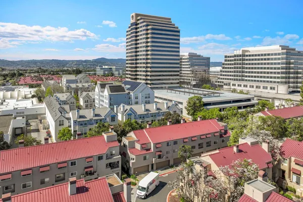 a view of city with tall buildings