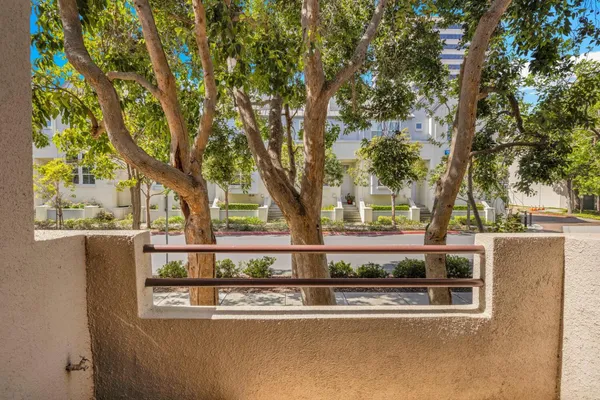 a view of house with trees in the background