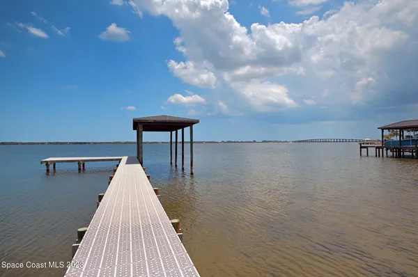 a view of an chairs in wooden floor