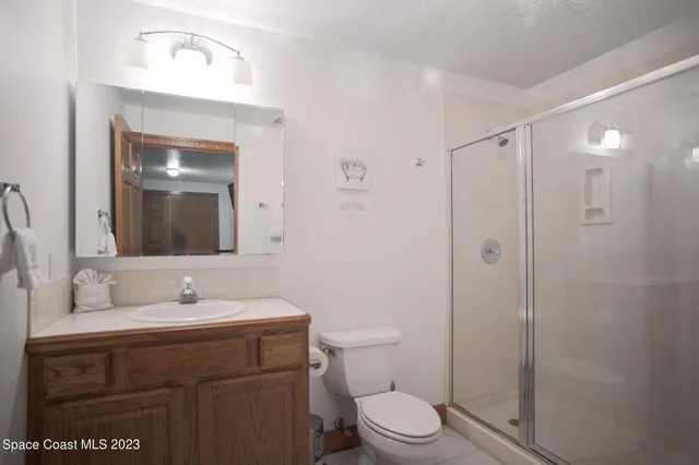 a kitchen with stainless steel appliances granite countertop a stove refrigerator sink and cabinets