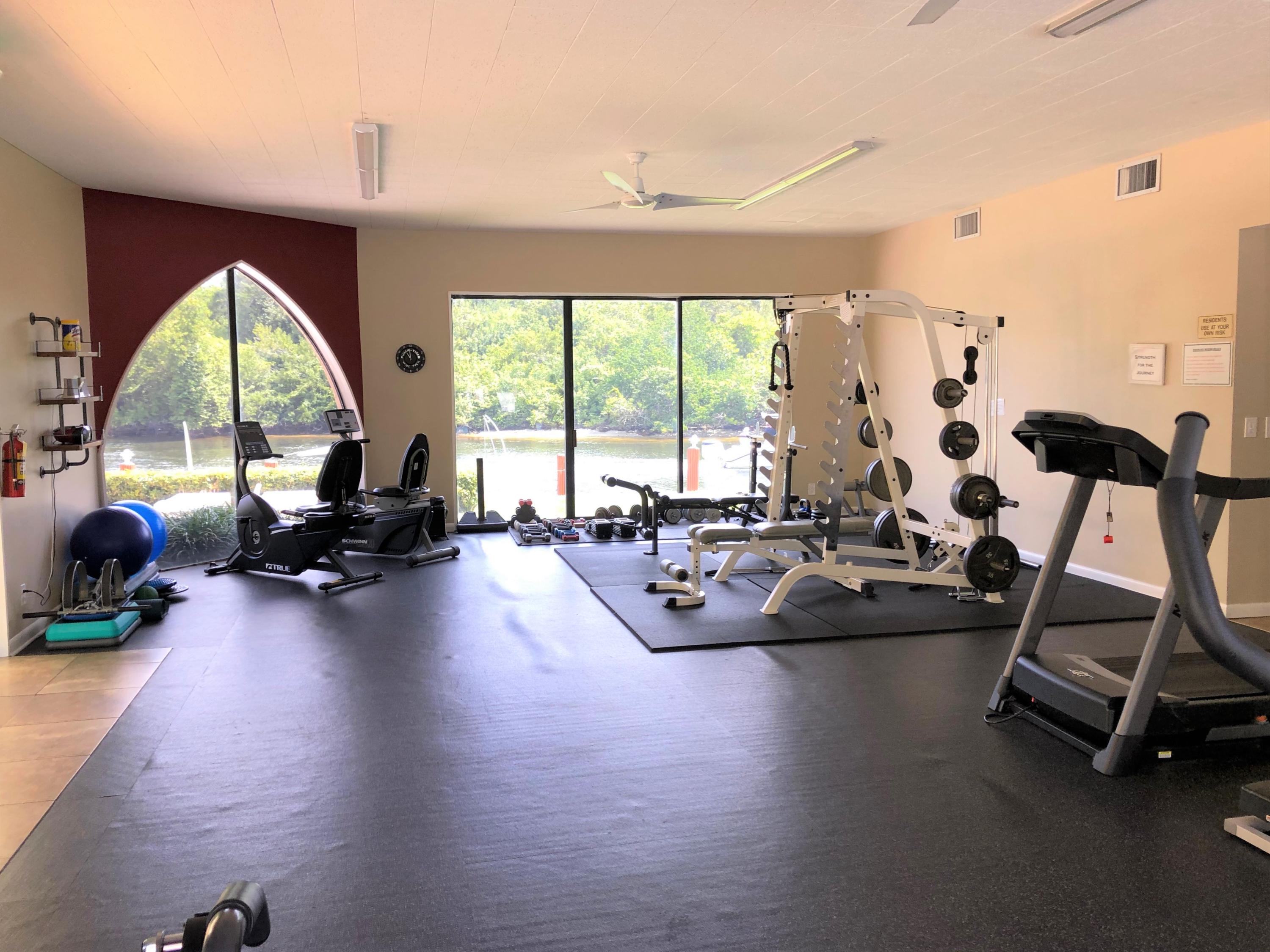 1631 Riverview Road, Unit 102 Deerfield Beach, FL 33441 - Photo 28 of 37 a view of a room with gym equipment
