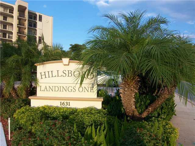 1631 Riverview Road, Unit 102 Deerfield Beach, FL 33441 - Photo 4 of 37 a sign on the side of a building