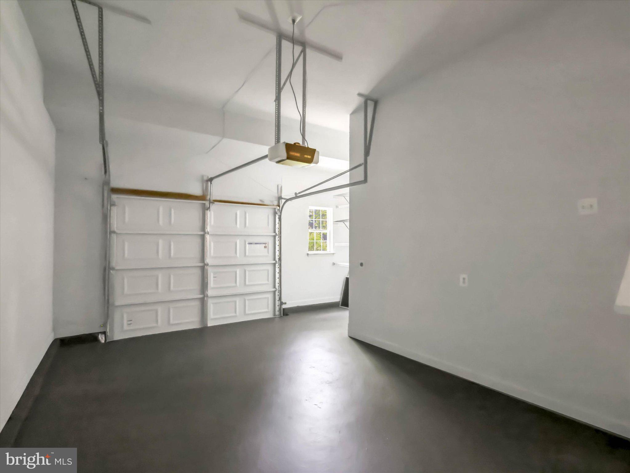 8104 Pepper Ridge Way Gaithersburg, MD 20877 - Photo 51 of 62 Spacious garage with modern design.