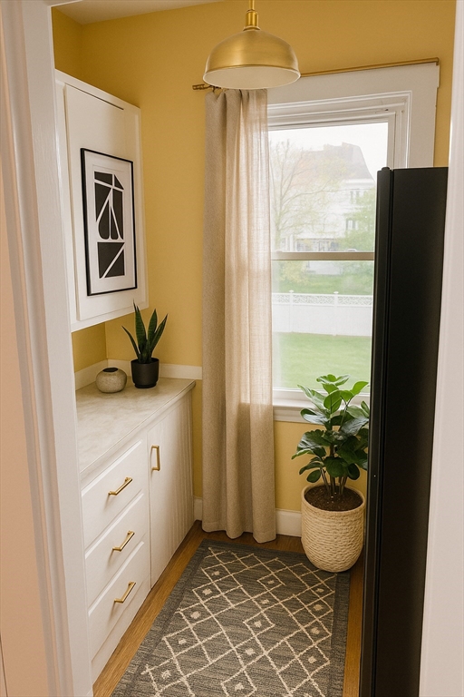 90 Boylston Street, Unit 1 Watertown, MA 02472 - Photo 3 of 16 a bathroom with a sink and a shower