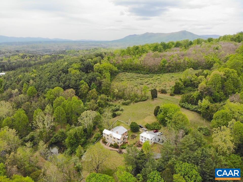 325 Union Run Lexington, VA 24450 - Photo 2 of 56 a view of a lake with green field