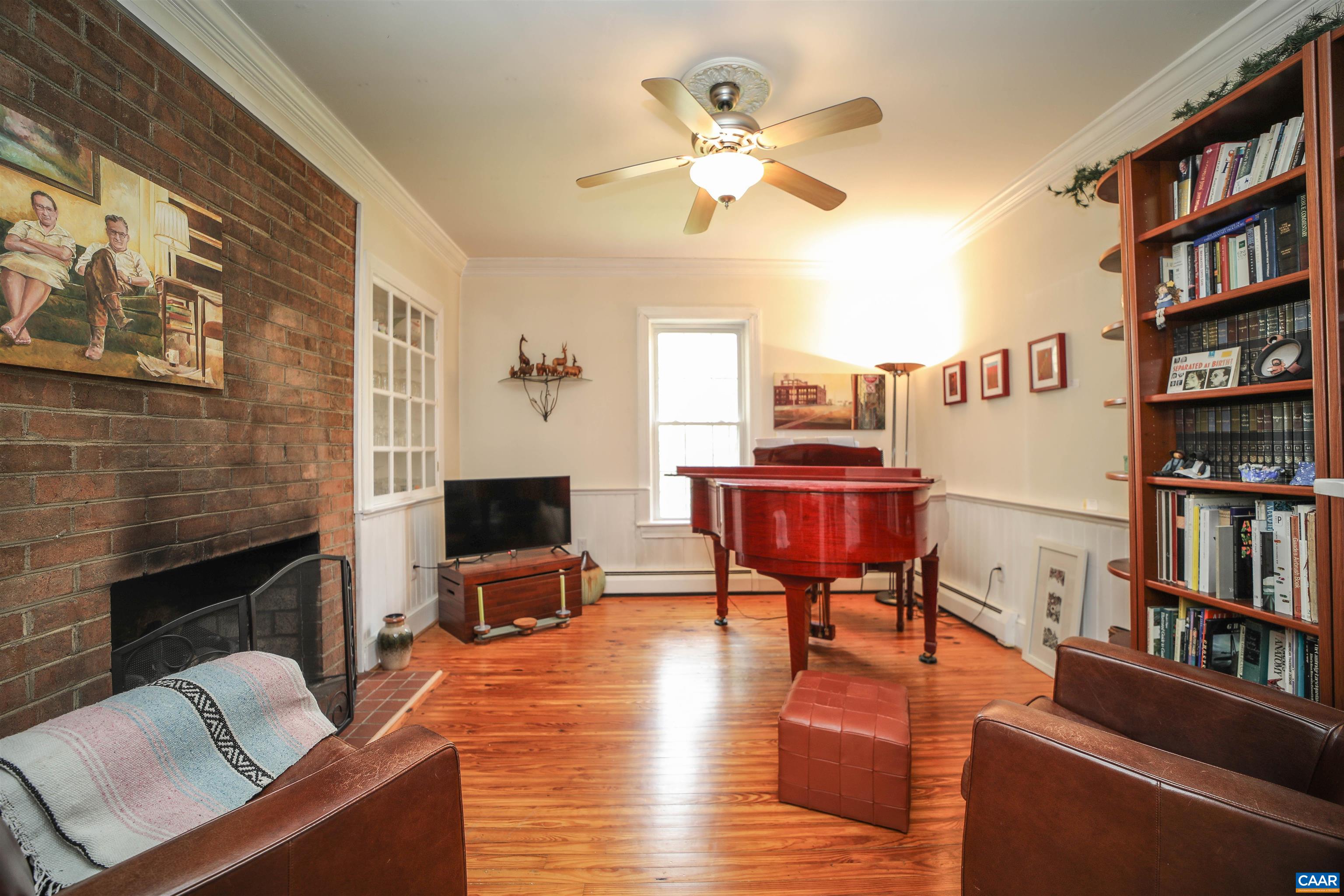 325 Union Run Lexington, VA 24450 - Photo 25 of 56 a living room with furniture and a flat screen tv
