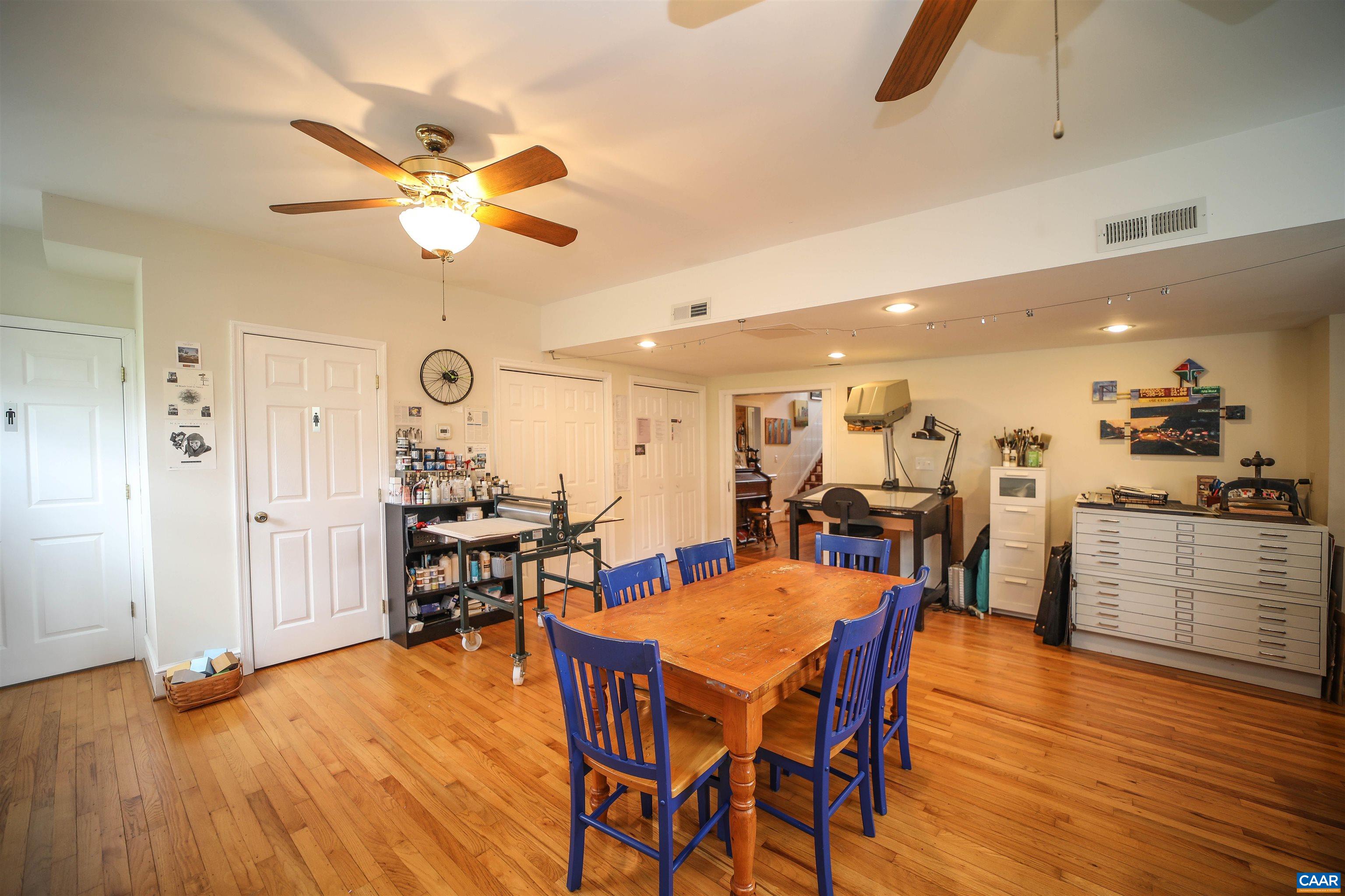 325 Union Run Lexington, VA 24450 - Photo 27 of 56 a view of a dining room with furniture and wooden floor