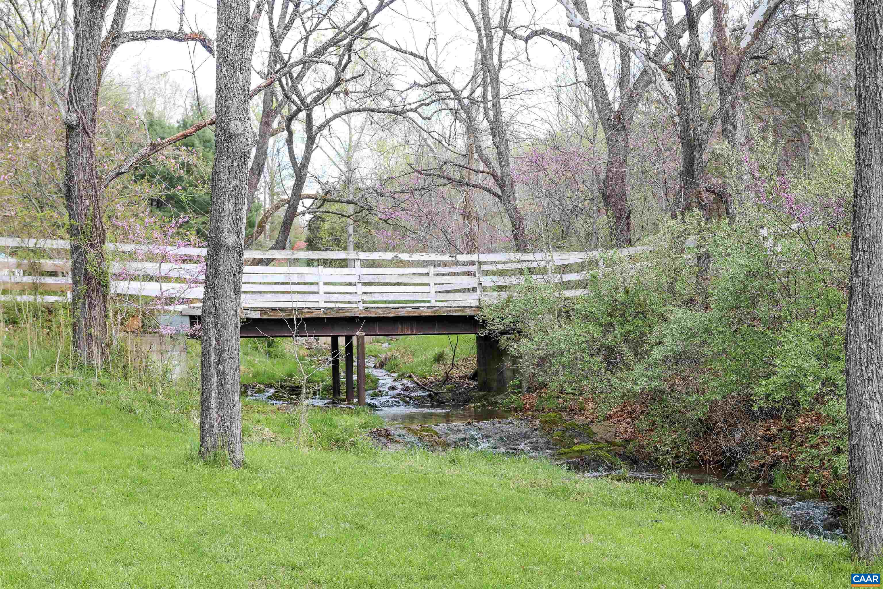 325 Union Run Lexington, VA 24450 - Photo 10 of 56 a backyard of a house with lots of green space and fountain