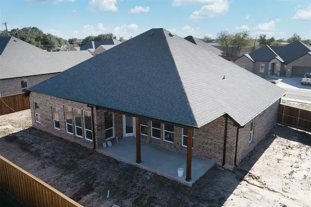 a view of balcony with furniture