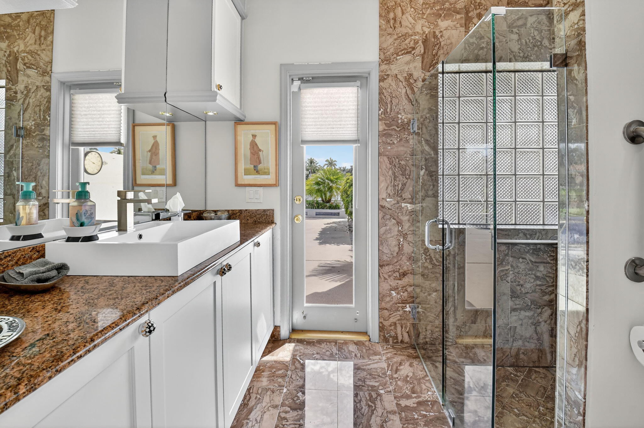 7336 Ballantrae Court Boca Raton, FL 33496 - Photo 16 of 32 a bathroom with a granite countertop sink and a mirror