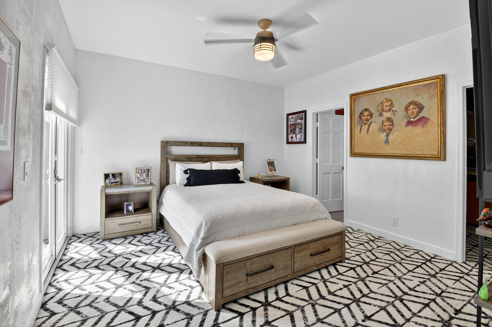 7336 Ballantrae Court Boca Raton, FL 33496 - Photo 19 of 32 a bedroom with a bed and a painting on the wall