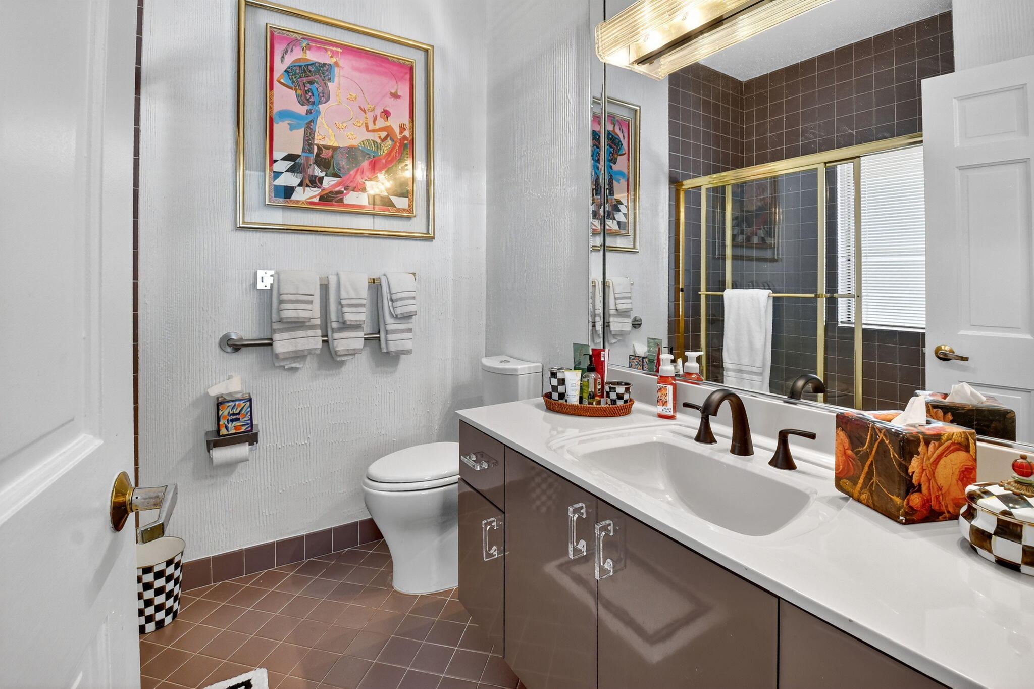 7336 Ballantrae Court Boca Raton, FL 33496 - Photo 20 of 32 a bathroom with a toilet sink and mirror