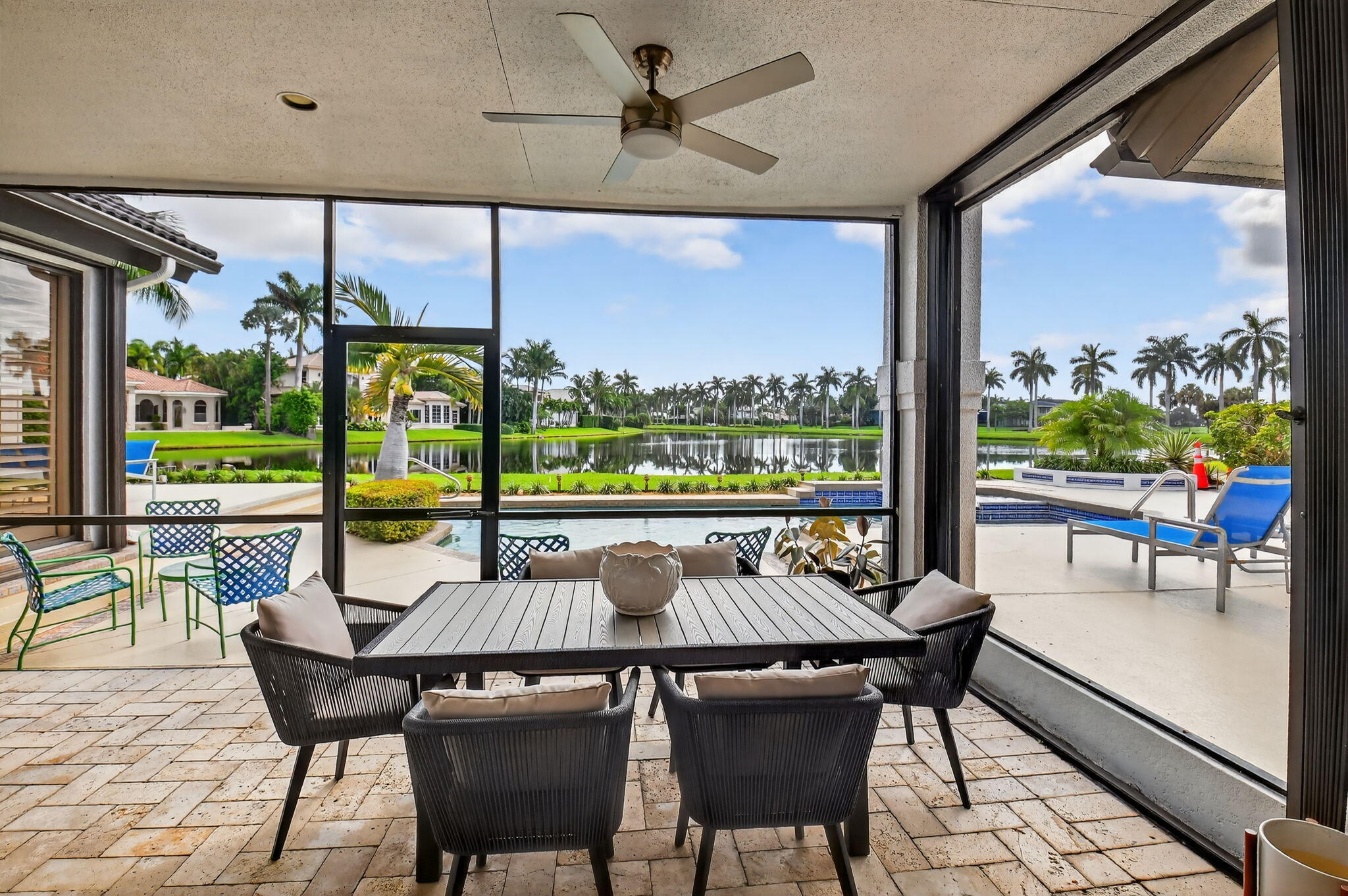 7336 Ballantrae Court Boca Raton, FL 33496 - Photo 27 of 32 a view of a dining room with furniture window and outside view