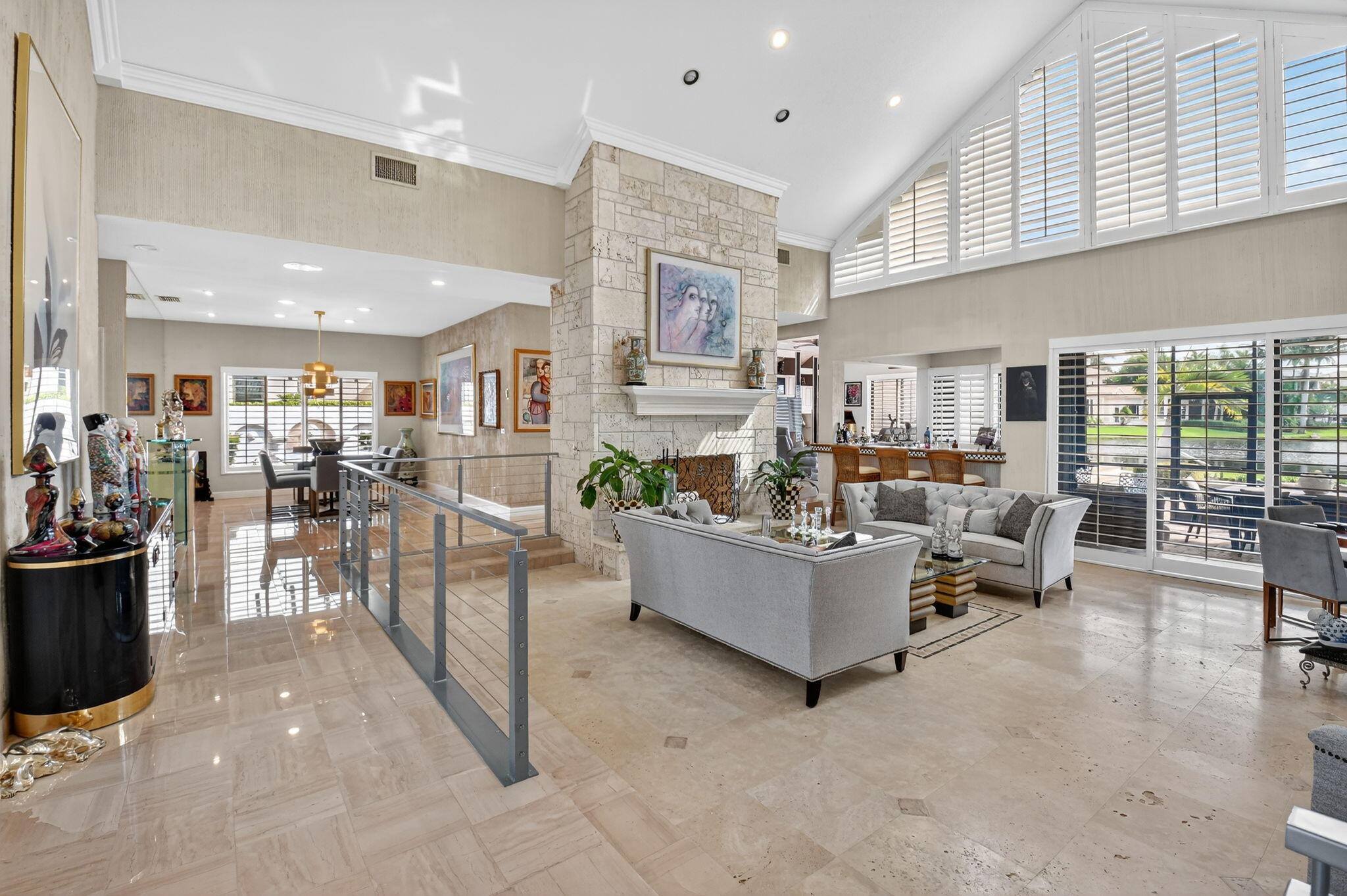 7336 Ballantrae Court Boca Raton, FL 33496 - Photo 5 of 32 a living room with furniture and a table