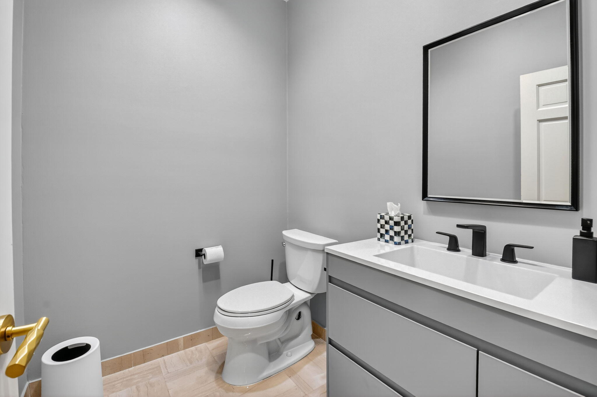 7336 Ballantrae Court Boca Raton, FL 33496 - Photo 8 of 32 a bathroom with a toilet a sink and mirror