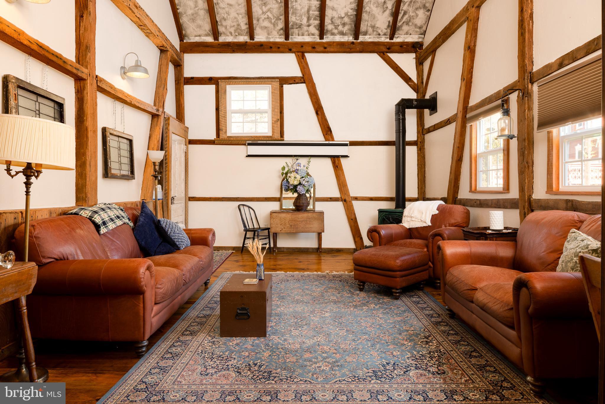 333 New Bethel Church Road Kempton, PA 19529 - Photo 31 of 48 a living room with furniture and a large window