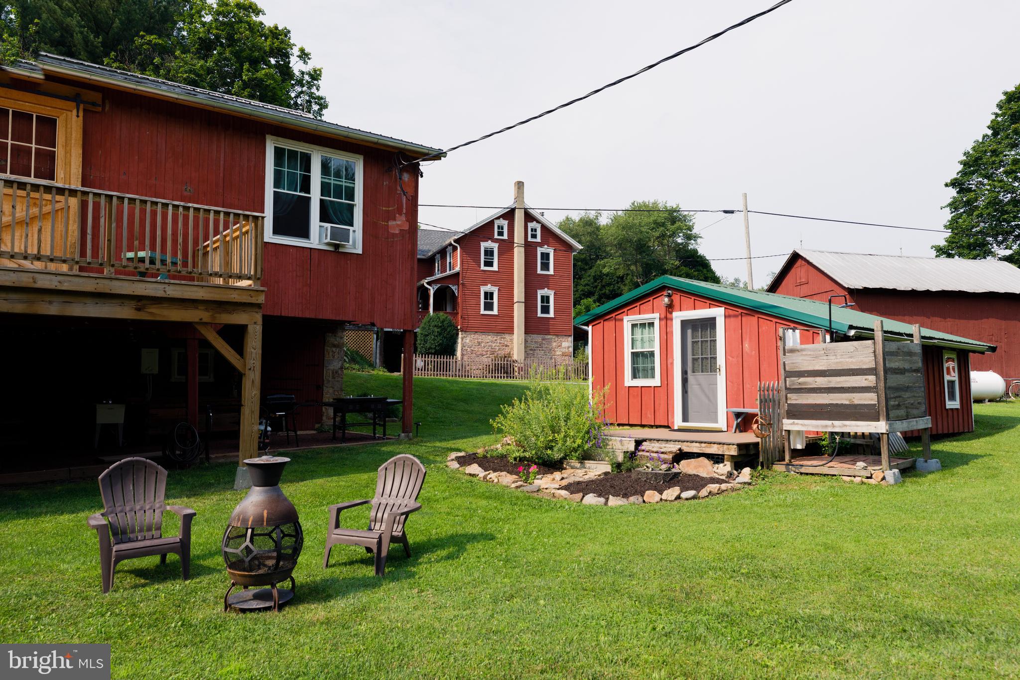 333 New Bethel Church Road Kempton, PA 19529 - Photo 34 of 48 a front view of house with yard and outdoor seating