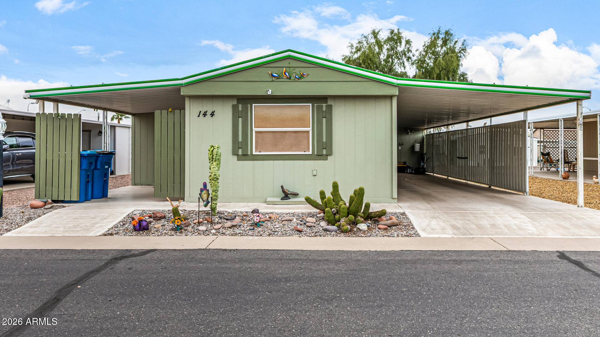 834 South Meridian Road, Unit 144 Apache Junction, AZ 85120 - Photo 2 of 43 a front view of a house