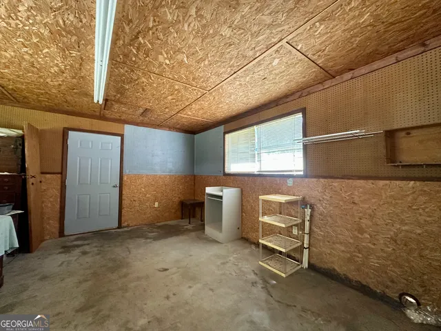 a room with furniture and windows