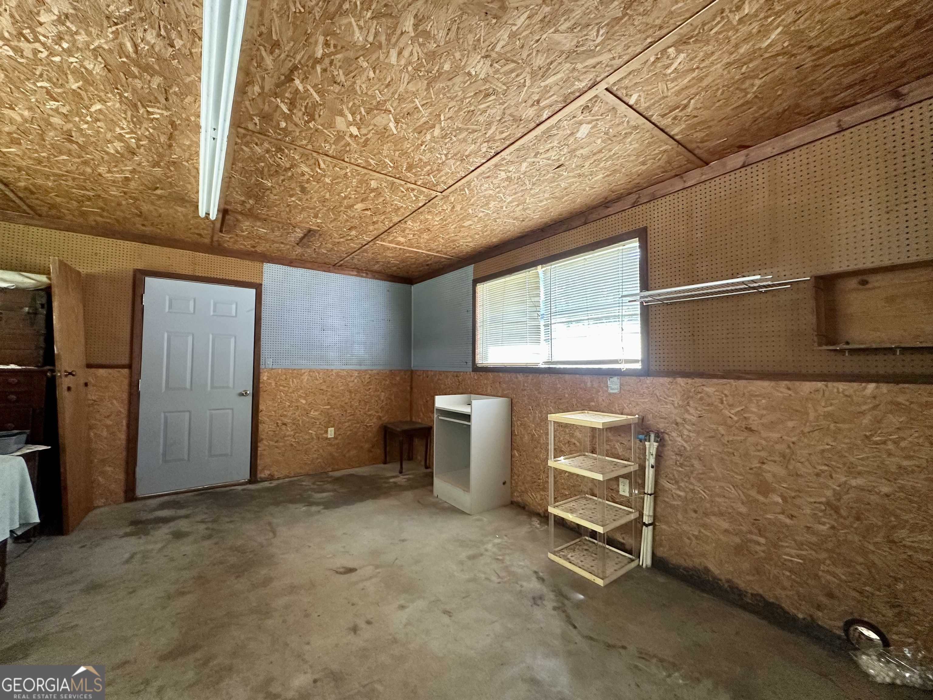 45 Mt Zion Street Milan, GA 31060 - Photo 18 of 27 a room with furniture and windows