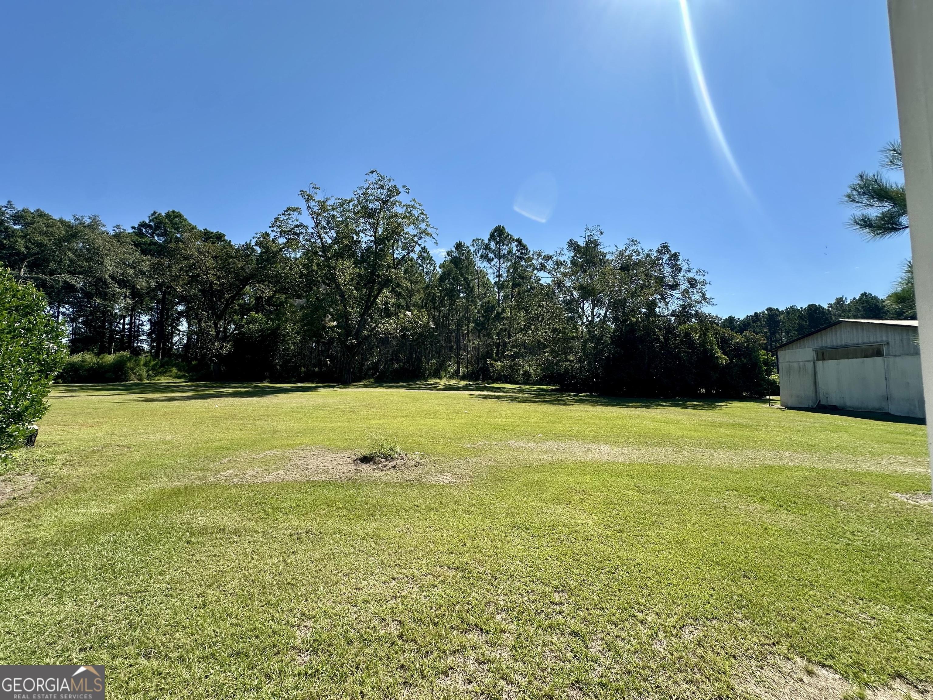 45 Mt Zion Street Milan, GA 31060 - Photo 19 of 27 a view of a swimming pool and an outdoor space