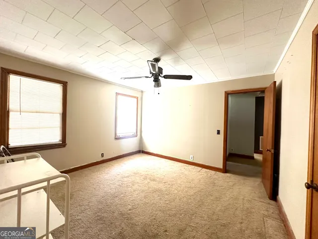 a view of a room with a window