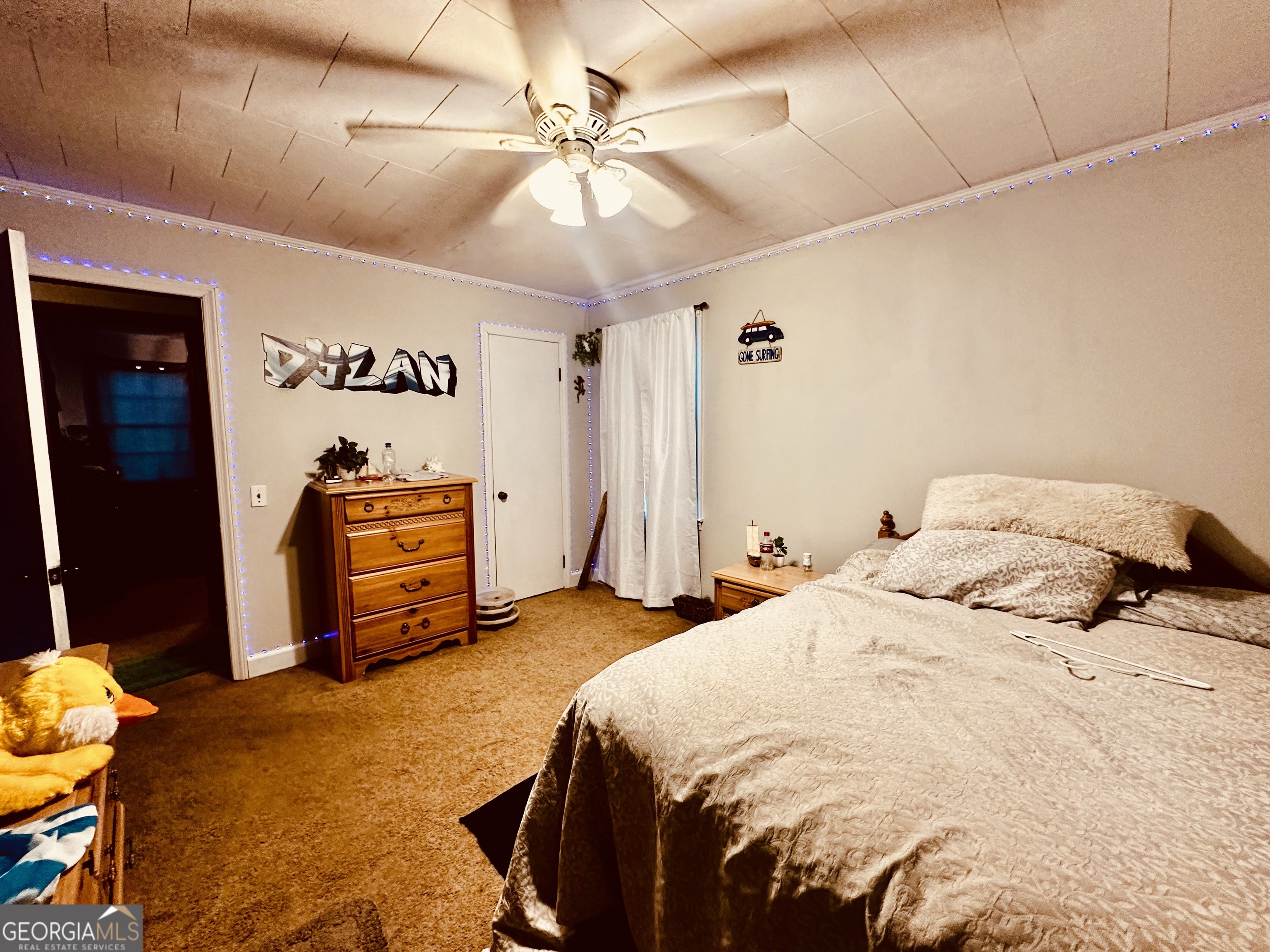 45 Mt Zion Street Milan, GA 31060 - Photo 7 of 27 a bedroom with a bed and a ceiling fan