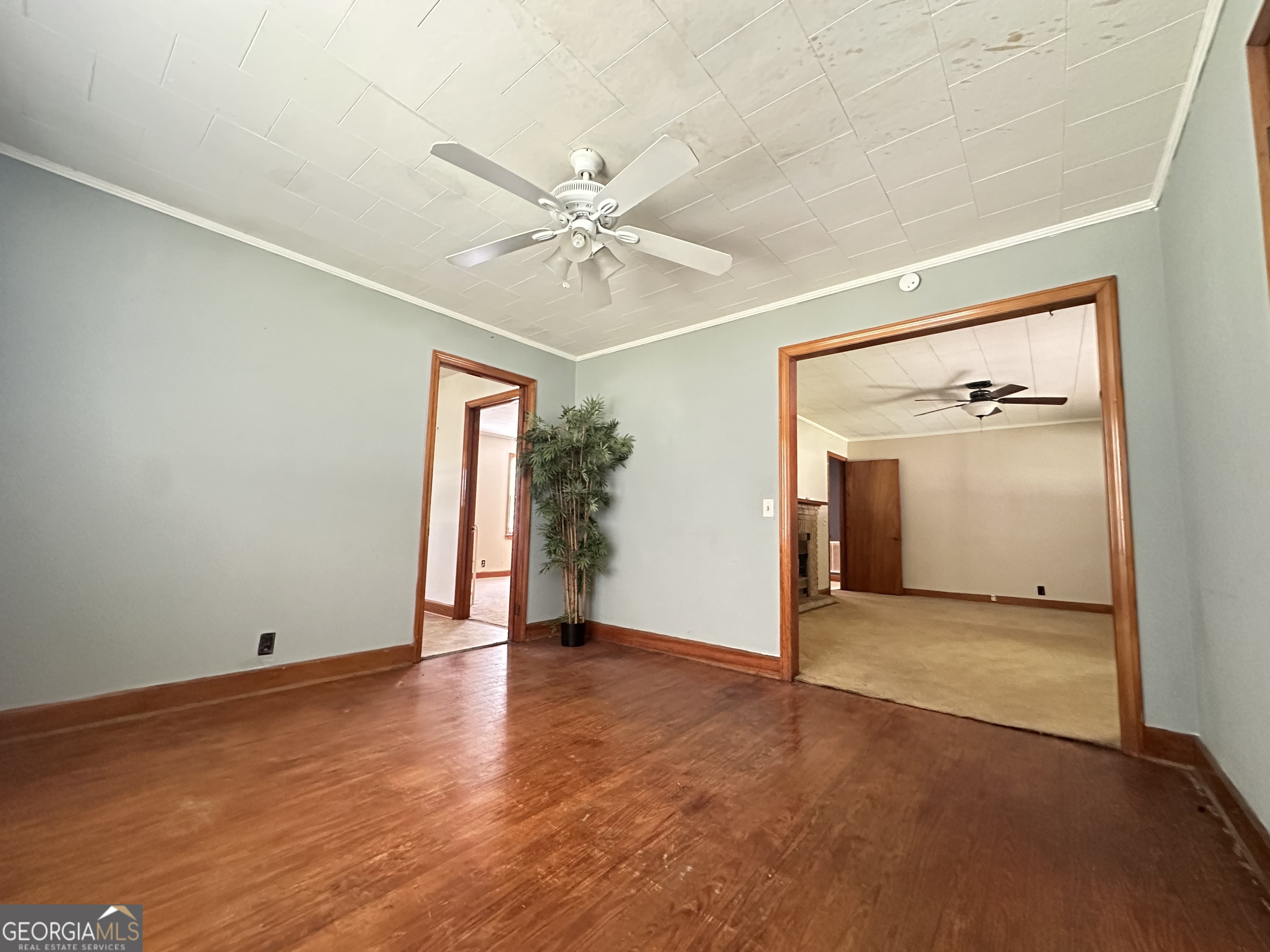 45 Mt Zion Street Milan, GA 31060 - Photo 10 of 27 an empty room with fan and entrance