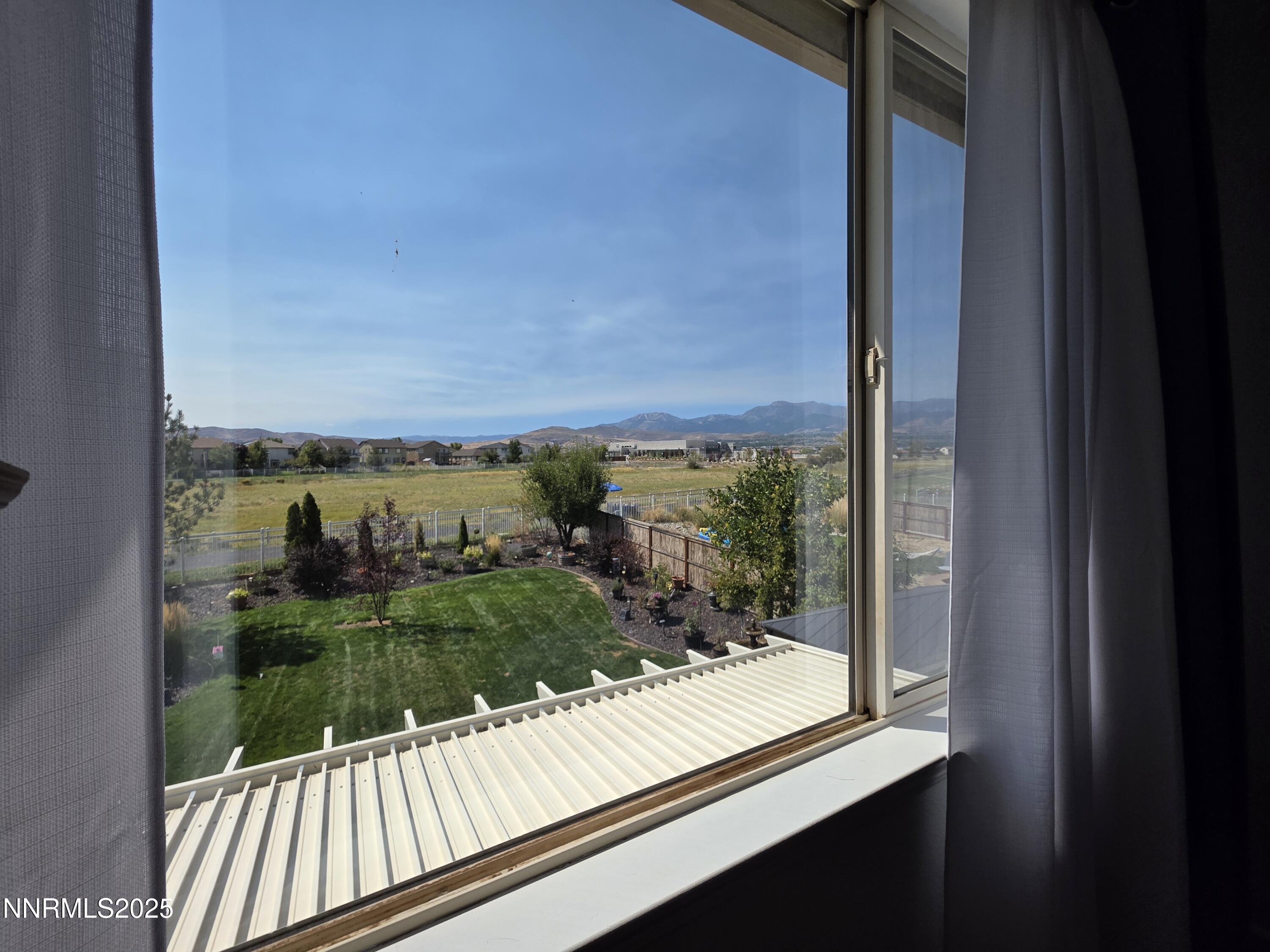 10677 Fire Poppy Circle Reno, NV 89521 - Photo 29 of 45 a view of a balcony with yard