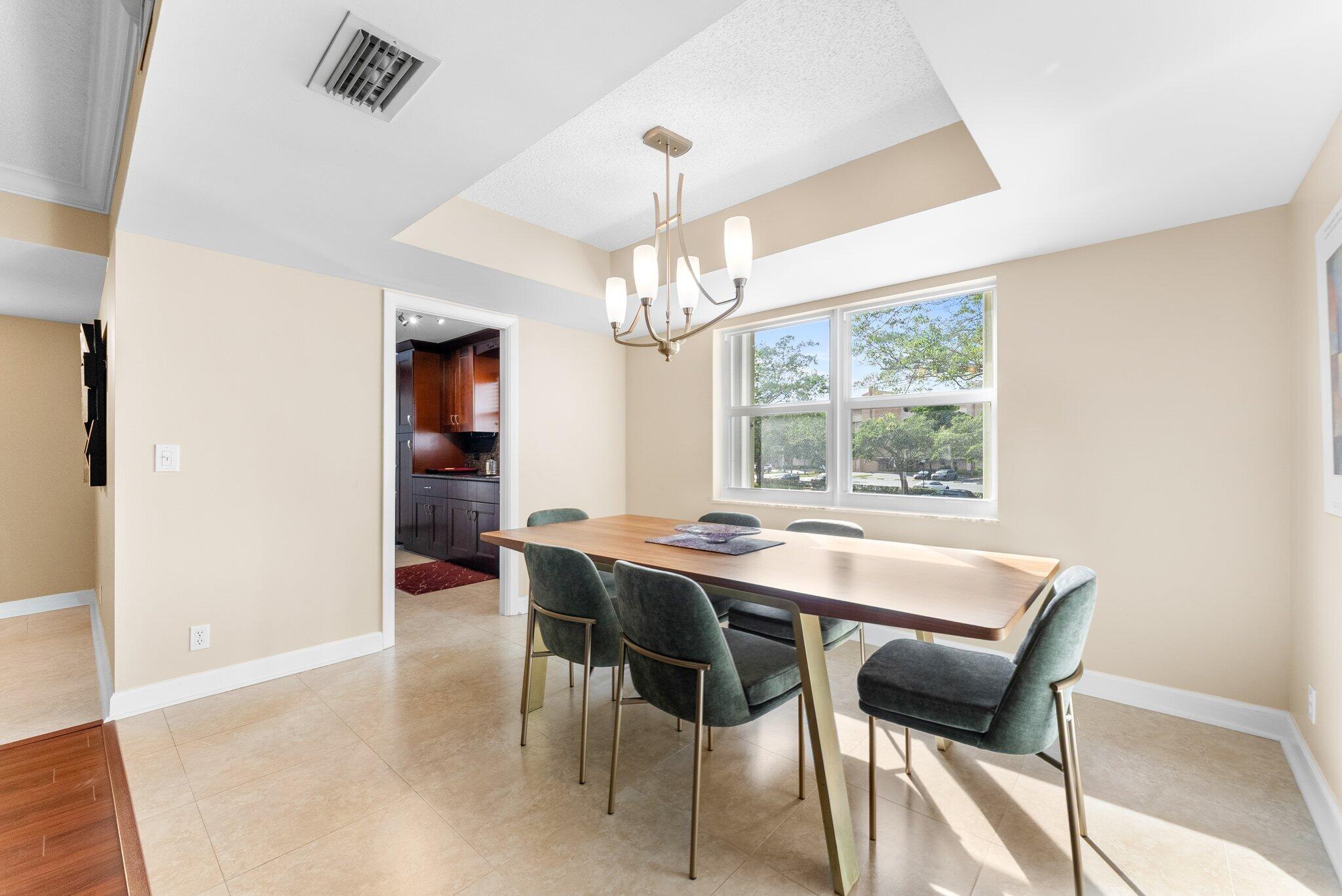 6300 Northwest 2nd Avenue, Unit 201 Boca Raton, FL 33487 - Photo 5 of 31 Dining area - 2