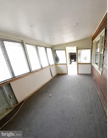 a view of a room with a window