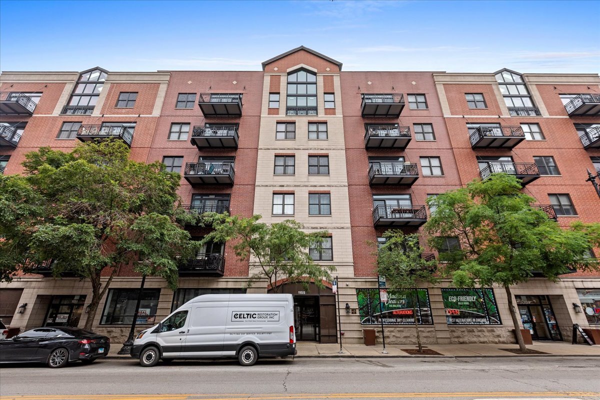 1155 West Madison Street, Unit 603 Chicago, IL 60607 - Photo 1 of 23 a car parked in front of a building