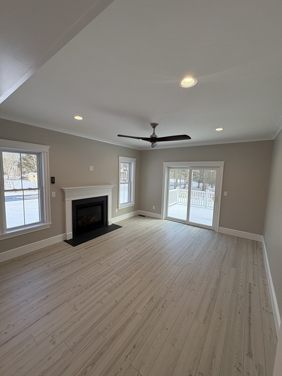 29 Range Avenue Taunton, MA 02780 - Photo 12 of 37 an empty room with windows and fireplace