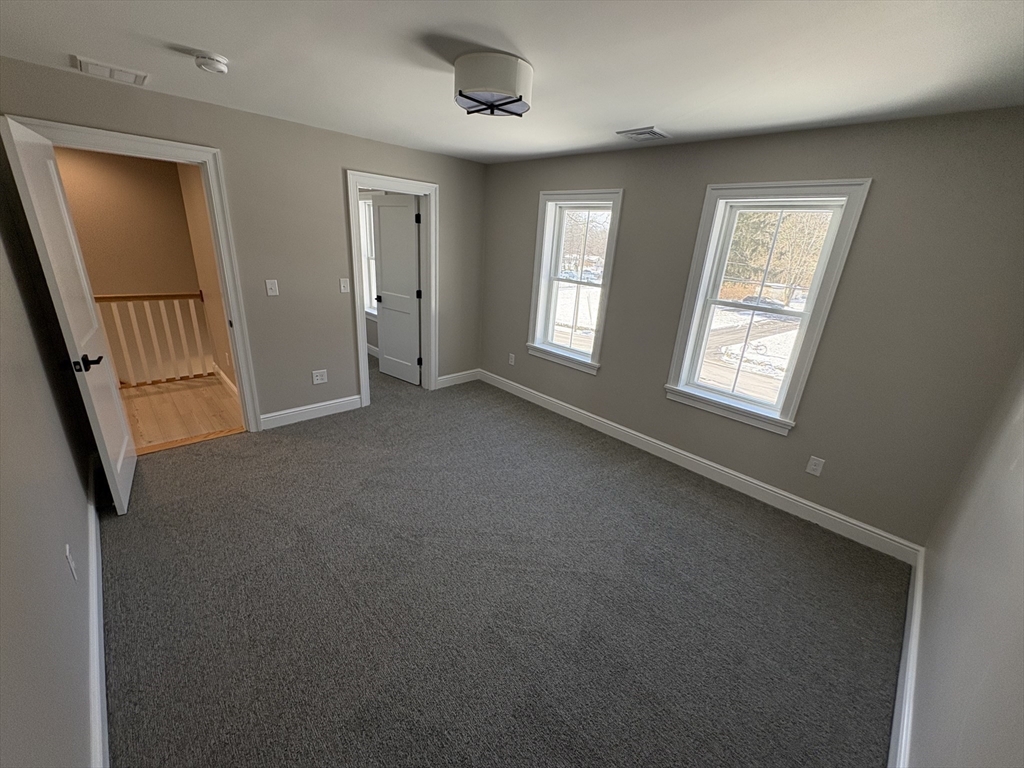 29 Range Avenue Taunton, MA 02780 - Photo 17 of 37 an empty room with windows and closet