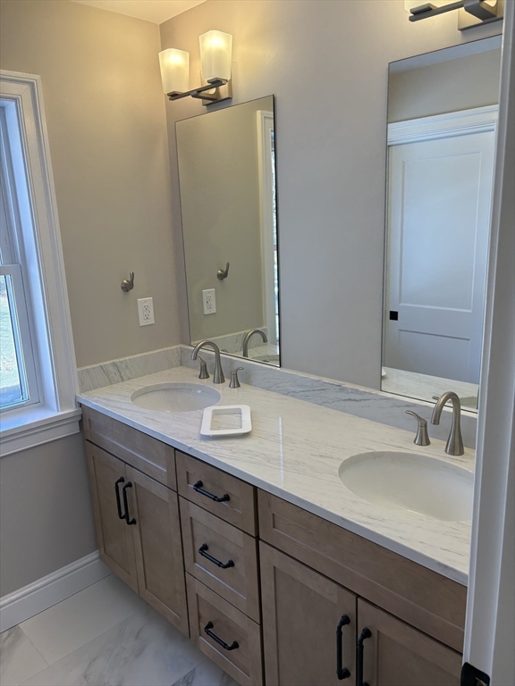 29 Range Avenue Taunton, MA 02780 - Photo 20 of 37 a bathroom with a sink and a mirror