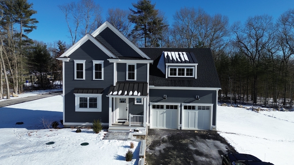 29 Range Avenue Taunton, MA 02780 - Photo 33 of 37 a front view of a house with a yard