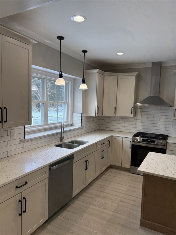 29 Range Avenue Taunton, MA 02780 - Photo 4 of 37 a kitchen with stainless steel appliances granite countertop a sink a stove and a wooden floor