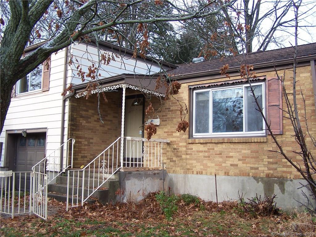 189 Beverly Road Wethersfield, CT 06109 - Photo 1 of 1 a front view of a house with parking