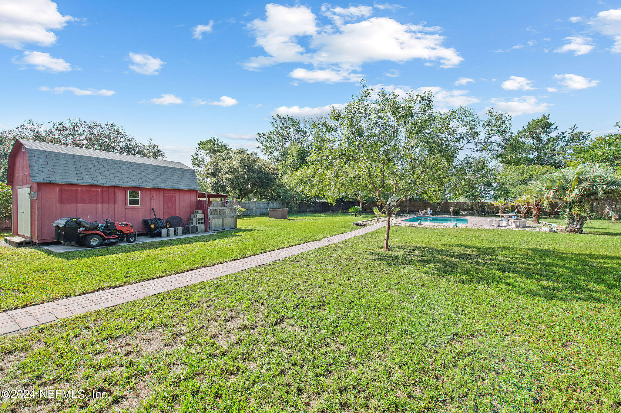 4065 Appaloosa Road Middleburg, FL 32068 - Photo 23 of 28 a view of a house with a backyard