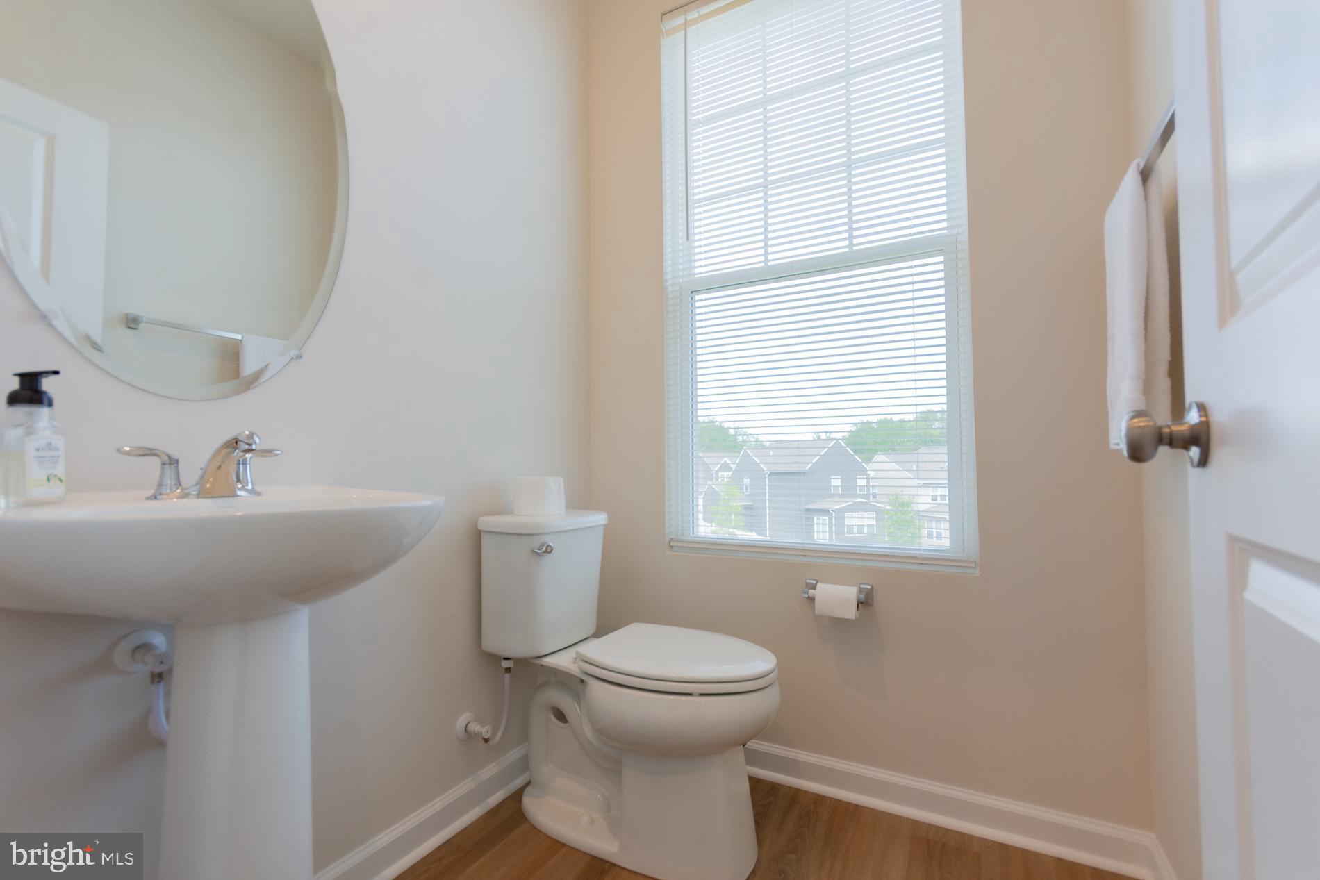 50 Coolidge Avenue Ranson, WV 25438 - Photo 18 of 47 a bathroom with a sink toilet and a window