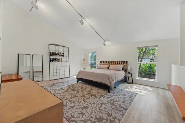 a view of an empty room with stairs