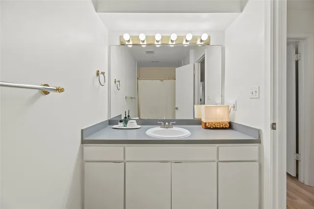 a living room with furniture rug and a window