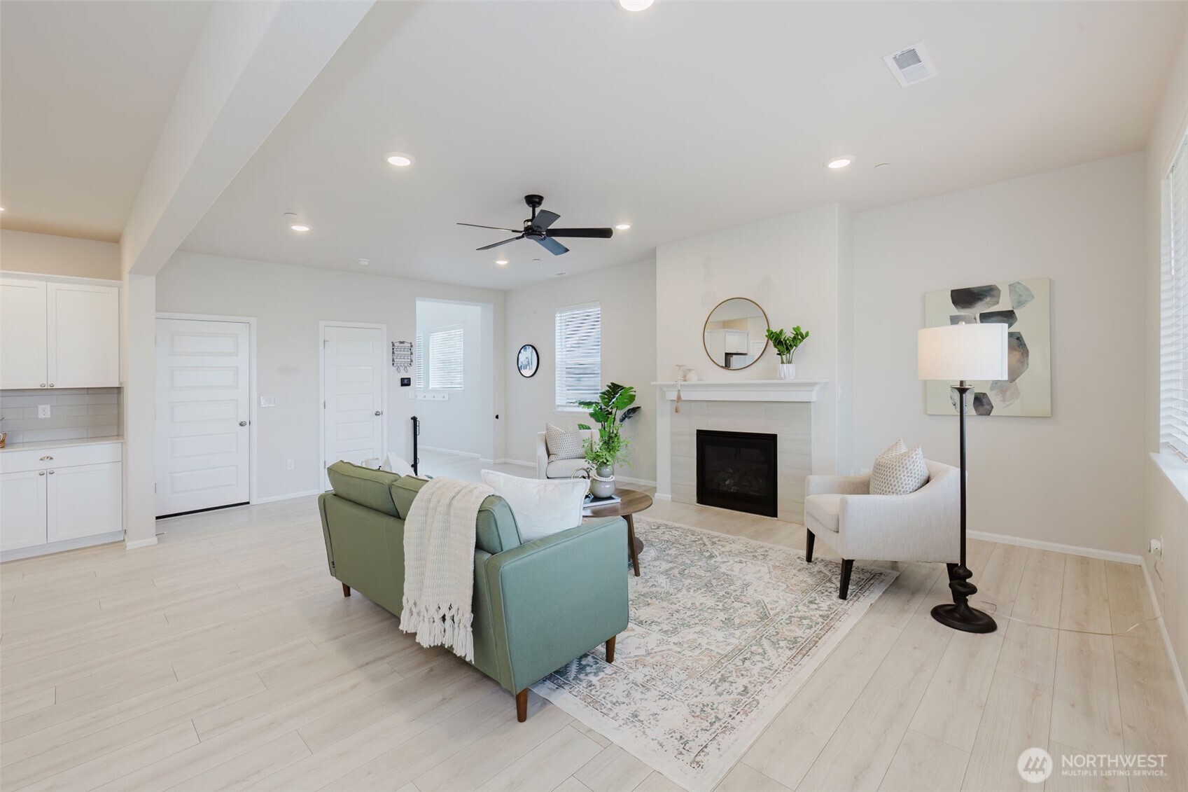 948 Panoramic Loop Bremerton, WA 98312 - Photo 13 of 30 a living room with furniture and a fireplace