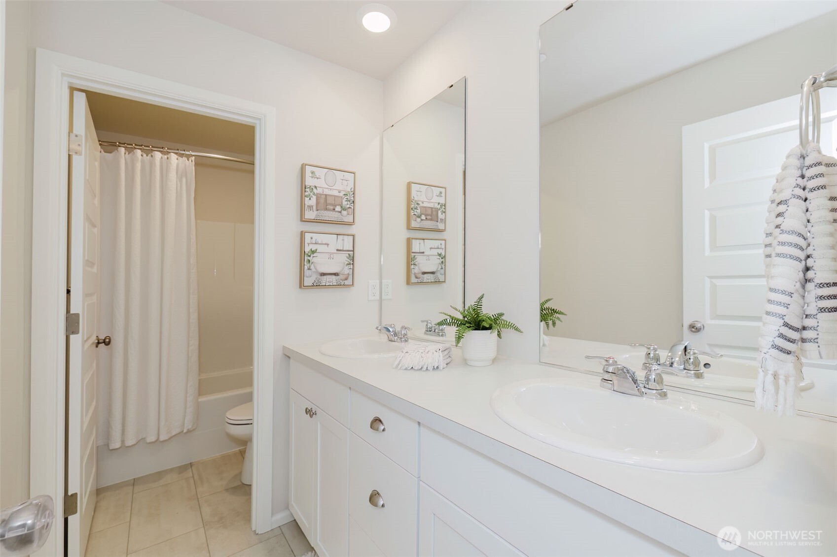 948 Panoramic Loop Bremerton, WA 98312 - Photo 22 of 30 a bathroom with a double vanity sink mirror and