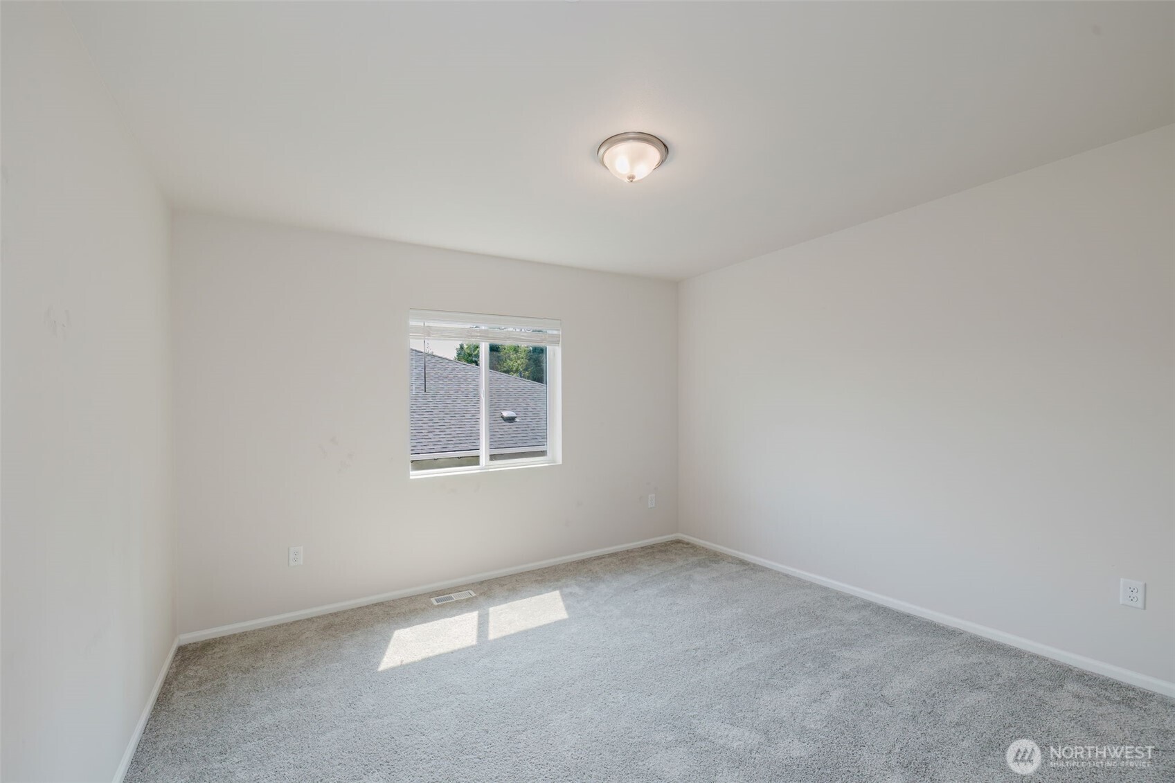 948 Panoramic Loop Bremerton, WA 98312 - Photo 23 of 30 an empty room with a window