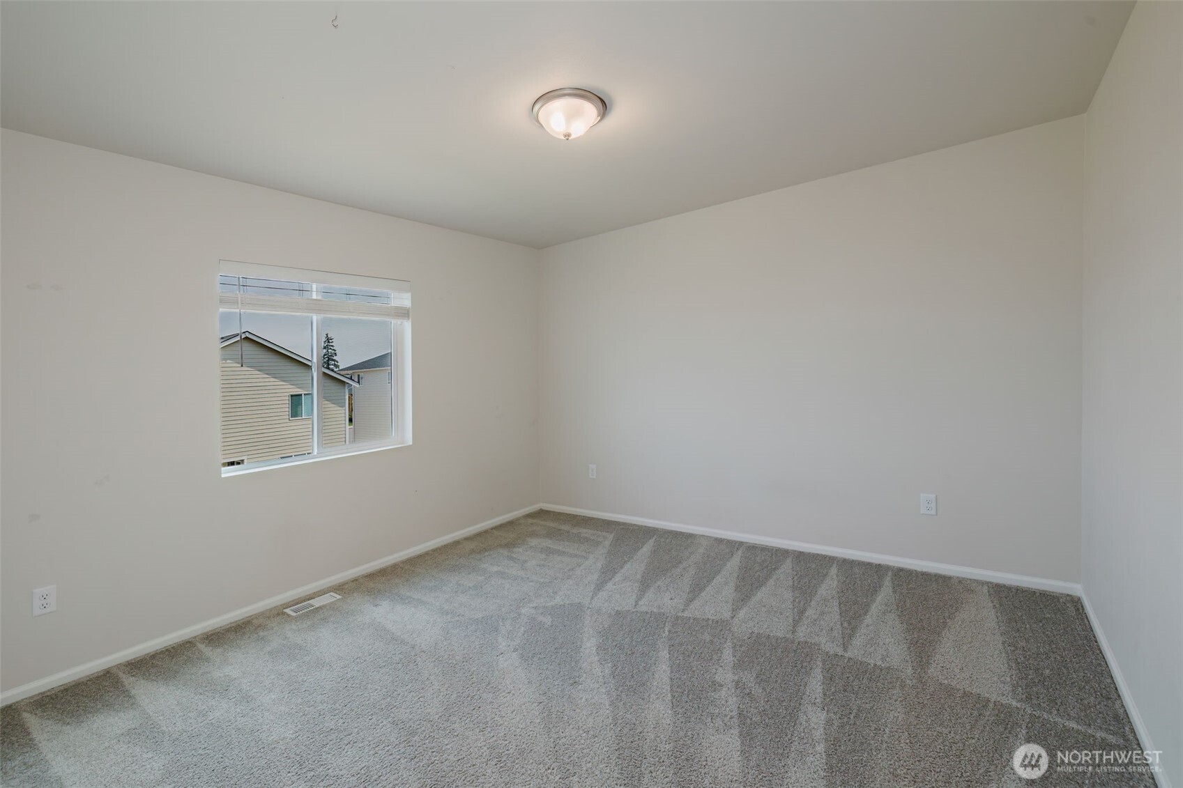 948 Panoramic Loop Bremerton, WA 98312 - Photo 25 of 30 an empty room with a window