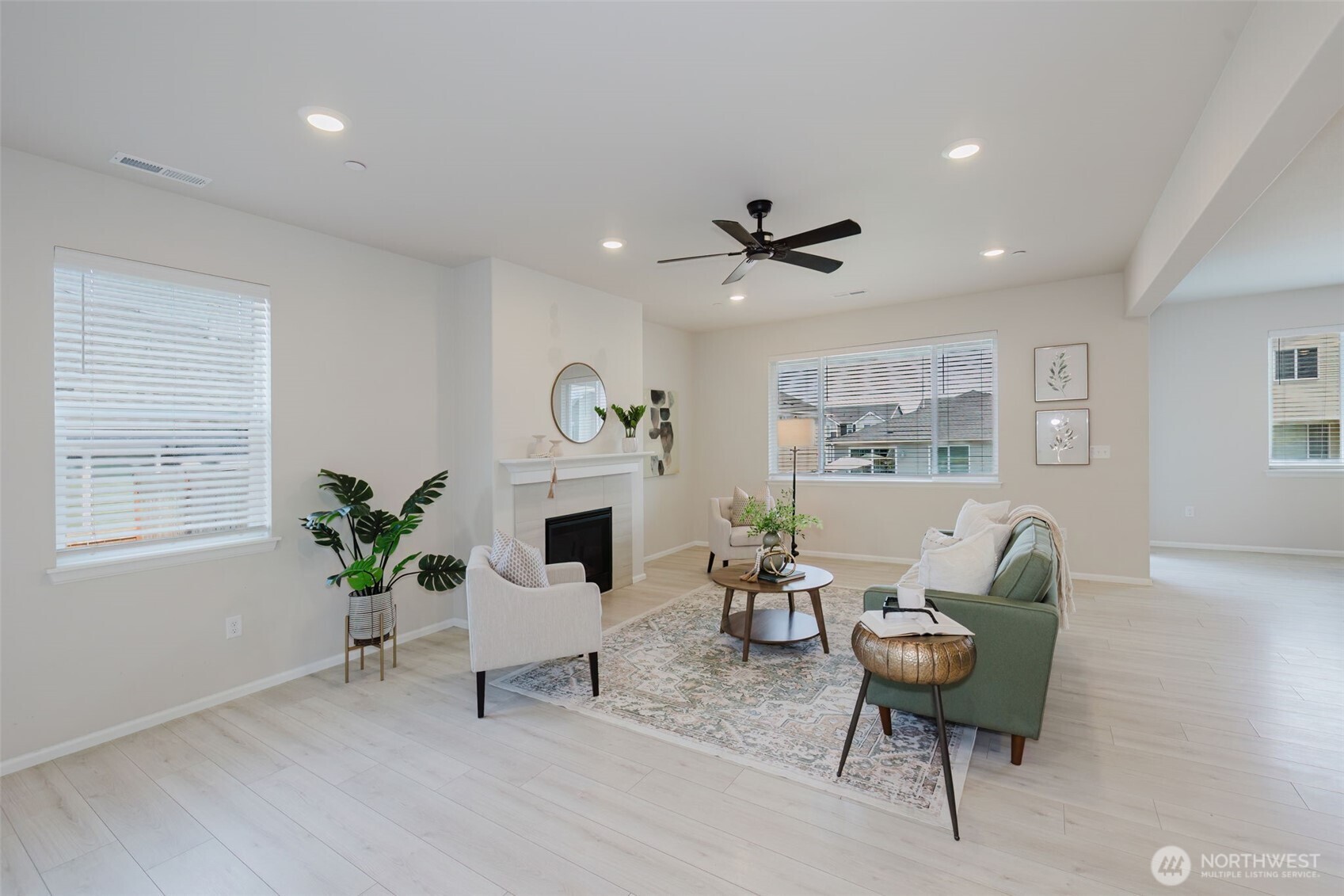 948 Panoramic Loop Bremerton, WA 98312 - Photo 6 of 30 a living room with furniture a window and a potted plant