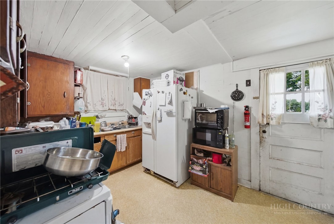 3450 Sparta Road North Wilkesboro, NC 28659 - Photo 7 of 34 a room with storage and utility