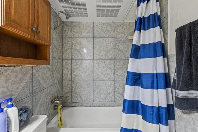 a view of small space with racks on the wall